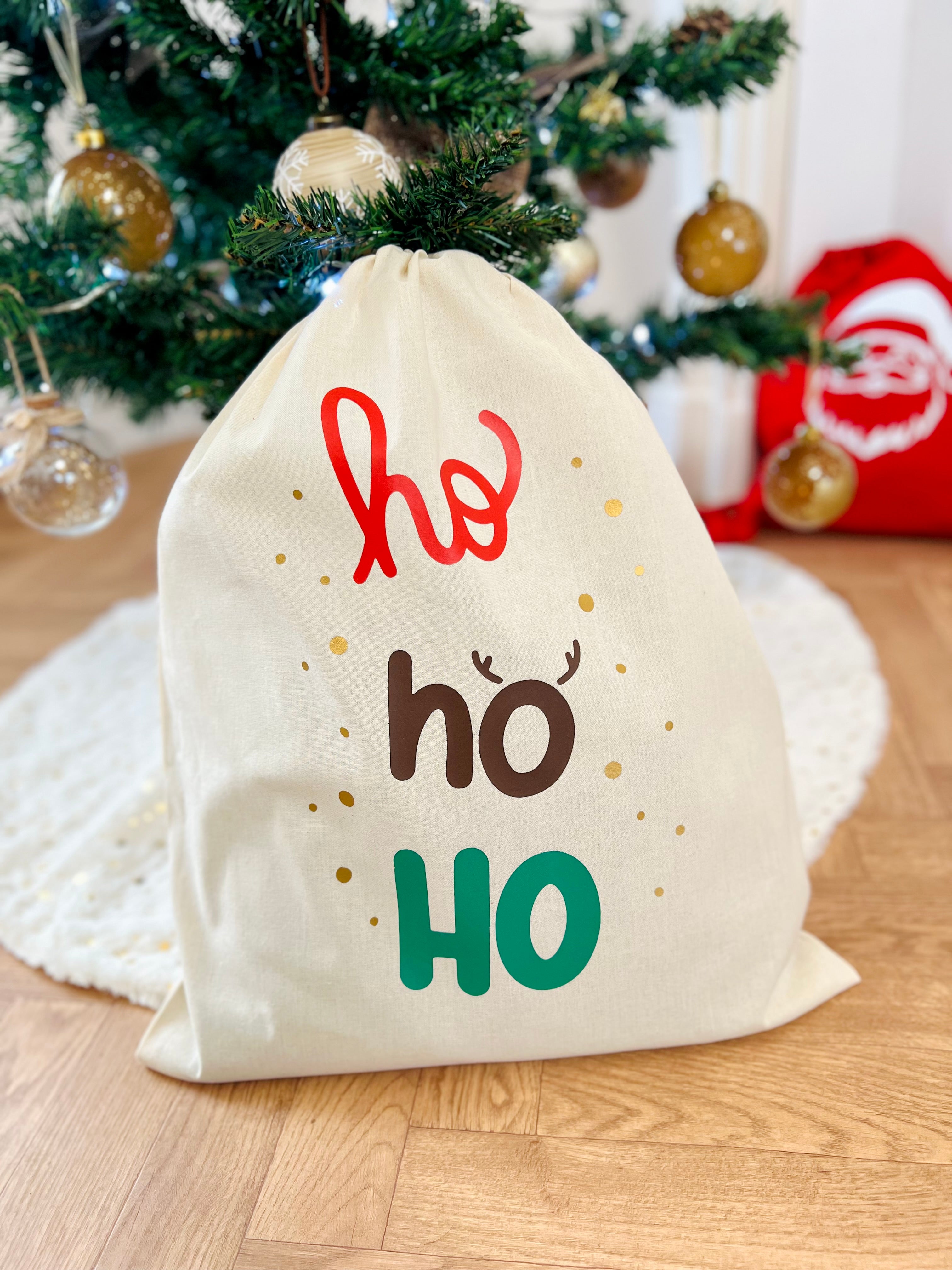 Hotte à cadeaux de Noël HO HO HO