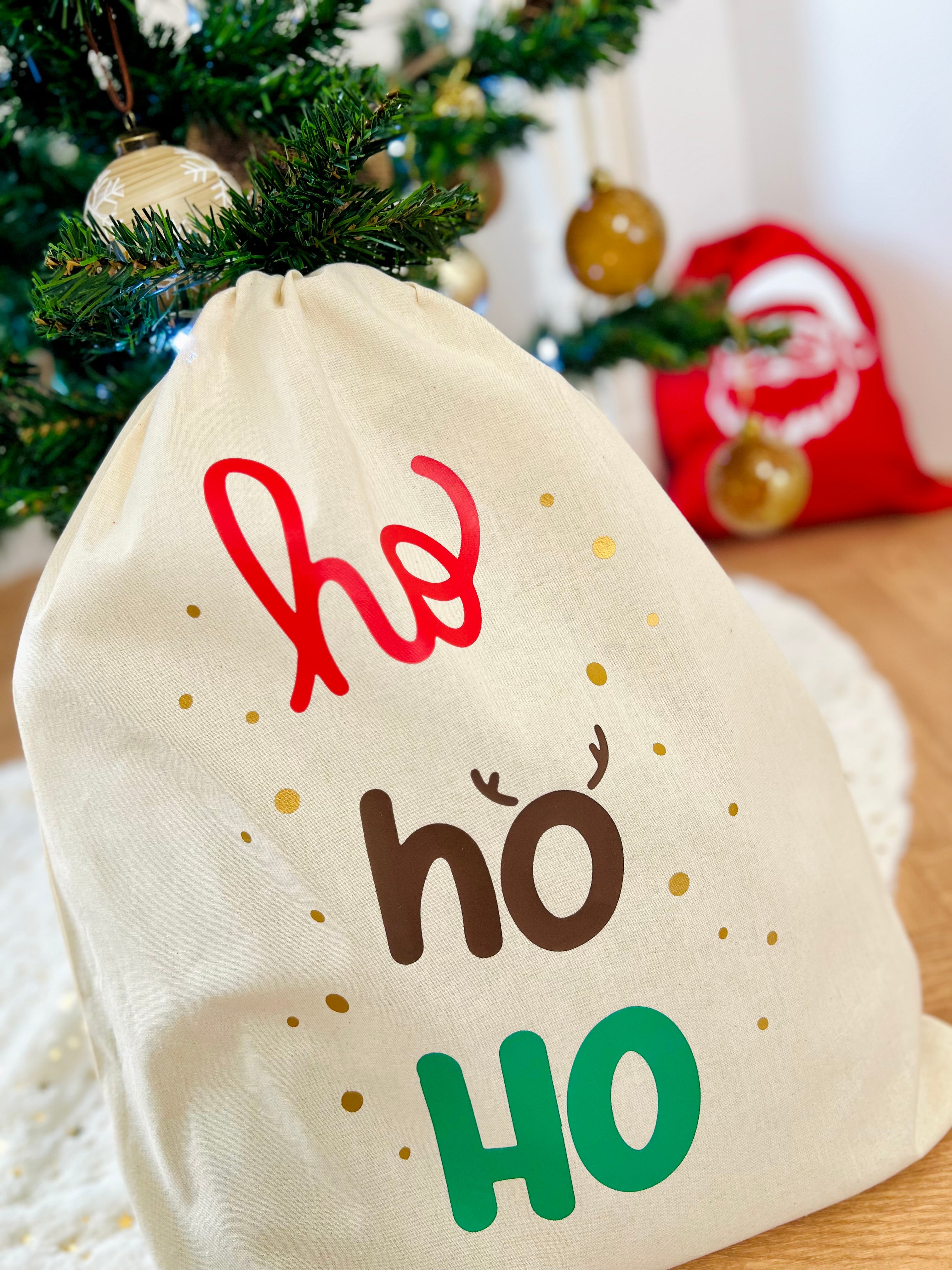 Hotte à cadeaux de Noël HO HO HO